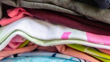 stack of clothes as background photo