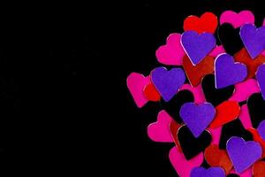 multicolored heart on black background for valentine's day photo