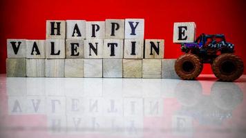 minahasa, Indonesia  January 2023, Happy valentine's day from stacked wooden blocks photo