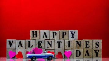 minahasa, Indonesia  January 2023, Happy valentine day on wooden blocks photo