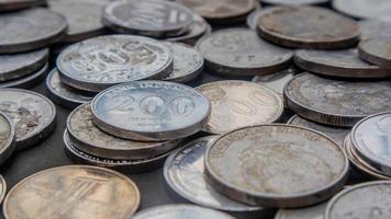 pile of rupiah coins as background photo