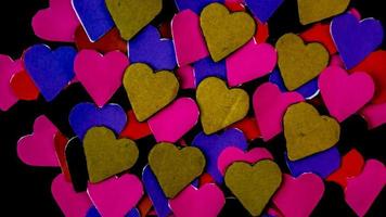 multicolored heart on black background for valentine's day photo