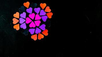 multicolored heart on black background for valentine's day photo