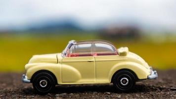 minahasa, Indonesia  January 2023, toy car in the rice field photo