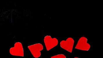 red heart on black background for valentine day photo