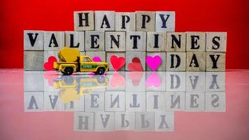 minahasa, Indonesia  January 2023, Happy valentine day on wooden blocks photo