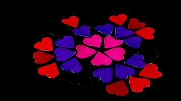 multicolored heart on black background for valentine's day photo