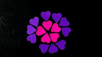 multicolored heart on black background for valentine's day photo