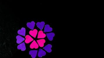 multicolored heart on black background for valentine's day photo