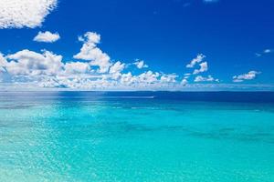 Landscape seascape aerial view over Maldives sea ocean lagoon. Amazing nature scenery, beautiful sea water, shades of blue. Tranquil nature environment background or wallpaper as aerial view photo