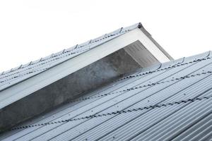 House roof ,generic view to facade of a new house photo