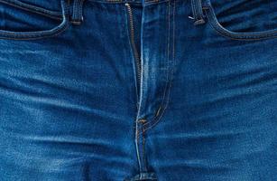 male blue denim jeans, open zip front background,vintage color of vintage denim jeans photo