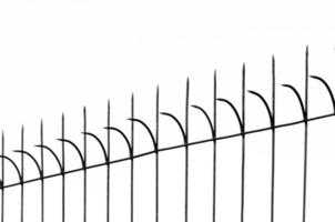 Old fashioned spike fence on white background,Steel sharp fence photo