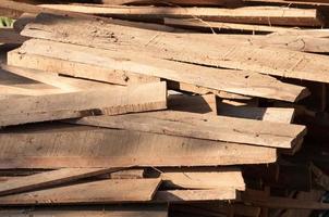Pile of wood logs for build Furniture production,sew natural wood scraps, ready to recycle and reuse process in improved waste management under efficient sustainable approach to save environment photo