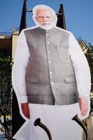 New Delhi, India - January 16 2023 - Prime Minister Narendra Modi cut out during BJP road show, the statue of PM Modi while attending a big election rally in the capital photo