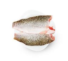 barramundi or seabass fish sliced with dish isolated on white background ,include clipping path photo