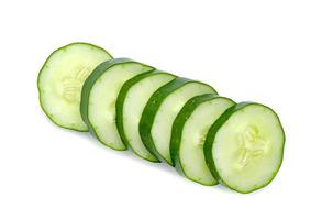 Fresh japanese cucumber sliced isolated on white background photo