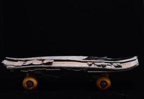 Old wooden skateboard photo