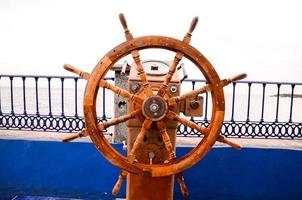 Steering wheel at the coast photo