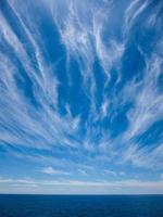 Blue sky over the sea photo