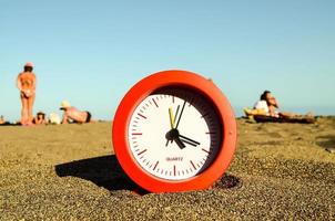 Clock at the beach photo