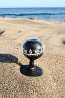 Compass at the beach photo