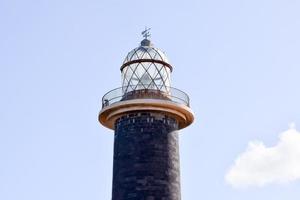 Lighthouse by the sea photo