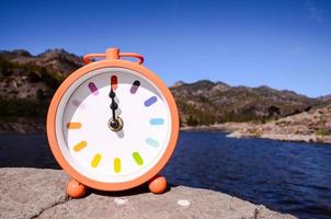 Clock on a rock photo