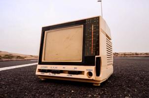 Old televison on the road photo