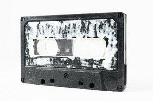 Old cassette tape on white background photo