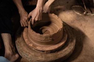 The process of forming traditional pottery crafts, located in Kasongan, Yogyakarta, Indonesia photo