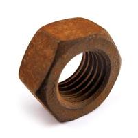 Old rusty nut isolated on white background. Full clipping path. photo