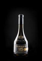 KRASNOYARSK, RUSSIA - NOVEMBER 01, 2022 Bottle of TORRES 15 brandy on a black background. photo