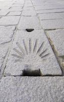 Camino de Santiago sign on the ground photo