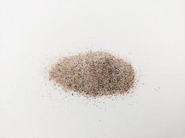 coffee grounds that should be scattered on a white background photo