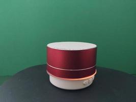 Wireless speaker spins on a stand photo