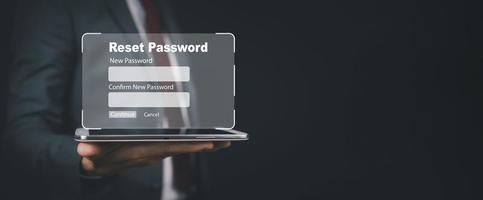 Security and reset password login online concept, Laptop with entering username and password of social media, log in with smartphone to an online bank account, data protection from hacker photo