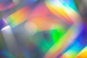 fondo de bokeh holográfico de arco iris. desbordamientos multicolores de color. foto