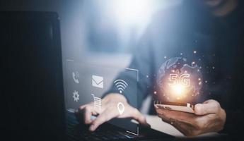 Businessman hold smartphone technology with 5G of mobile telecommunication network in Europe for high-speed wireless data connection to the internet from smartphones, future technology 5G network photo