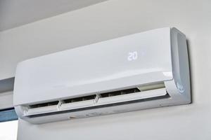 Air conditioner hanging on the wall, close up photo