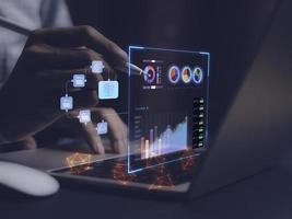 businessman working with business Analytics and Data Management System on computer, online document management and metrics connected to database. Corporate strategy for finance, operations, sales. photo