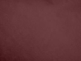 Winter Berry color dark red velvet fabric texture used as background. red fabric background of soft and smooth textile material. There is space for text. photo