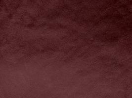 Winter Berry color dark red velvet fabric texture used as background. red fabric background of soft and smooth textile material. There is space for text. photo