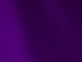 Dark purple velvet fabric texture used as background. Tone color purple cloth background of soft and smooth textile material. There is space for text and for all types of design work.. photo
