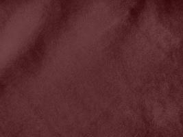 Winter Berry color dark red velvet fabric texture used as background. red fabric background of soft and smooth textile material. There is space for text. photo