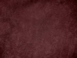 Winter Berry color dark red velvet fabric texture used as background. red fabric background of soft and smooth textile material. There is space for text. photo