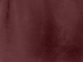 Winter Berry color dark red velvet fabric texture used as background. red fabric background of soft and smooth textile material. There is space for text. photo