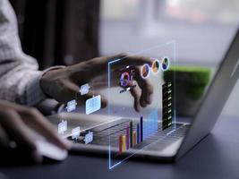 businessman working with business Analytics and Data Management System on computer, online document management and metrics connected to database. Corporate strategy for finance, operations, sales. photo