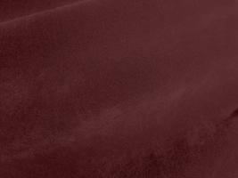 Winter Berry color dark red velvet fabric texture used as background. red fabric background of soft and smooth textile material. There is space for text. photo