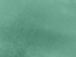 Padua green velvet fabric texture used as background.Light green fabric background of soft and smooth textile material. There is space for text. photo